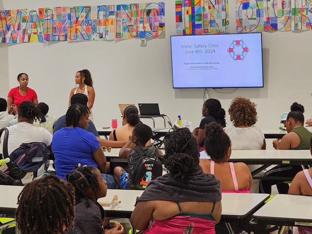 Celeste Bloomfied addressing a crowd on water safety